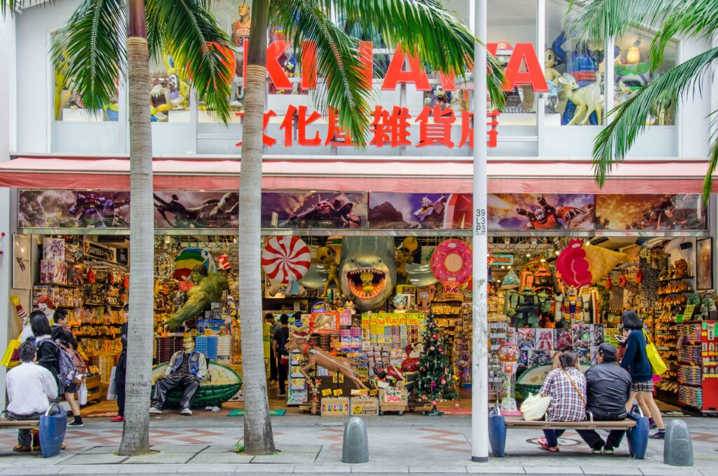 A vibrant Japanese store with a colorful and eclectic storefront, filled with toys, figurines, and decorations